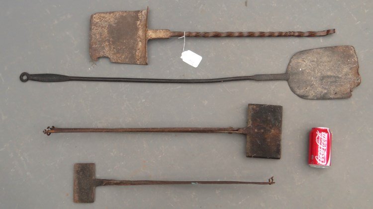 Metalware: Lot 18th/19th c. metalware including (2) waffle irons (25 1/2" and 31" L.), (2) iron peels (33" and 46" L.). Provenance Dr. Jamie Turndorf Millbrook New York.