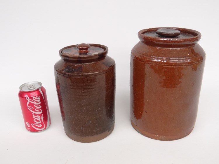 Redware Lot: Lot (2) 19th c. redware jars. 8 1/2" and 9 1/2" Ht. Provenance Dr. Jamie Turndorf Millbrook New York.