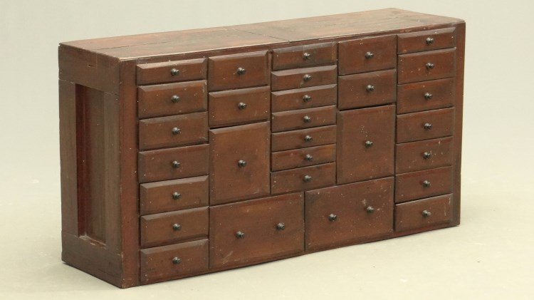 19th c. Apothecary Cupboard: 19th c. (29) drawer table top apothecary cupboard. 35" x 10" x 18 1/2" Ht. Drawers made with cigar boxes.