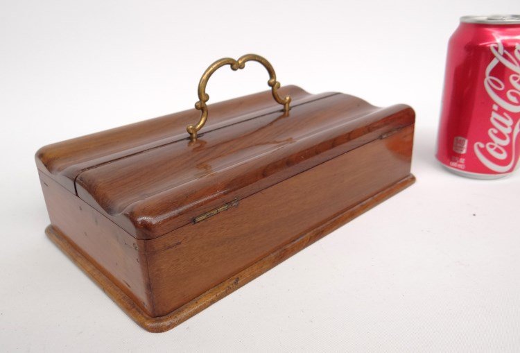 Writing Box: 19th c. writing box with brass handle and two flip tops and brass handle. Retains bottles and compartment lid. 9 1/2" x 5 1/2" x 5" Ht.
