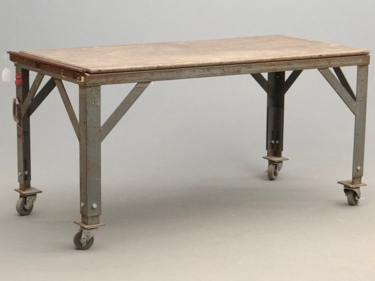 Industrial Work Table: Industrial rolling work table. Top 32" x 69", 34" Ht.