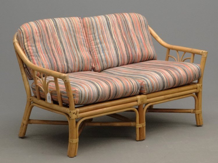 Rattan Settee: Rattan settee with cushions. 50" L.