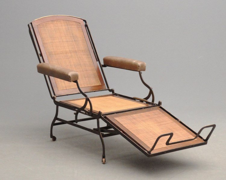 19th c. Iron Folding Recliner: Rare 19th c. iron folding recliner with caned seat. Raised on castors. Pinstripe decorated. 42 1/2" Ht. Property of a Salisbury Connecticut home.