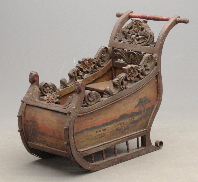 Continental Carved Sled: Early Continental carved and paint decorated push sled, sides painted with landscape with cows. 19 1/2" x 51" x 40" Ht.