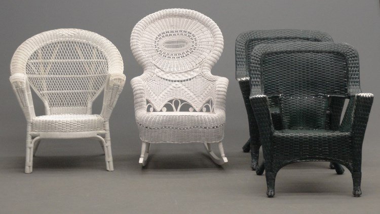 Wicker Lot: Lot including wicker chair, rocker and (2) plastic wicker style chairs.
