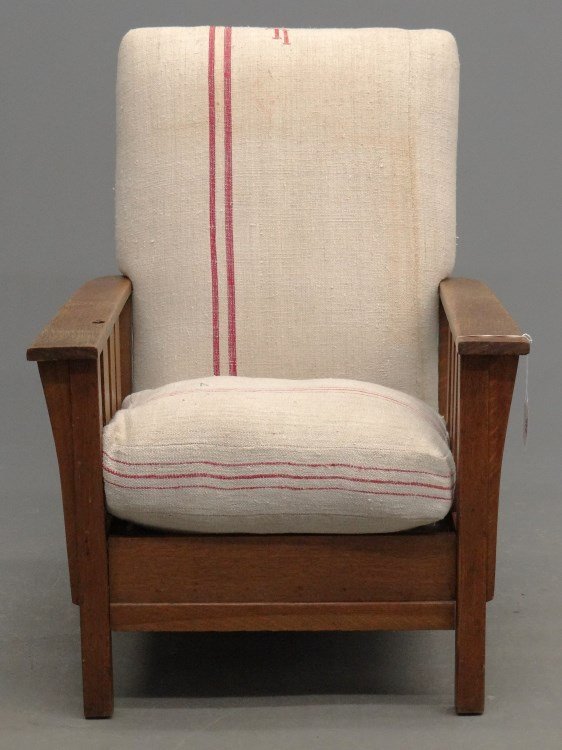 Mission Oak Armchair: C. 1900's Mission oak armchair with foot rest. 29" x 37" x 36" Ht. Labeled "Royal Easy Chair Co., Sturgis Mich.".