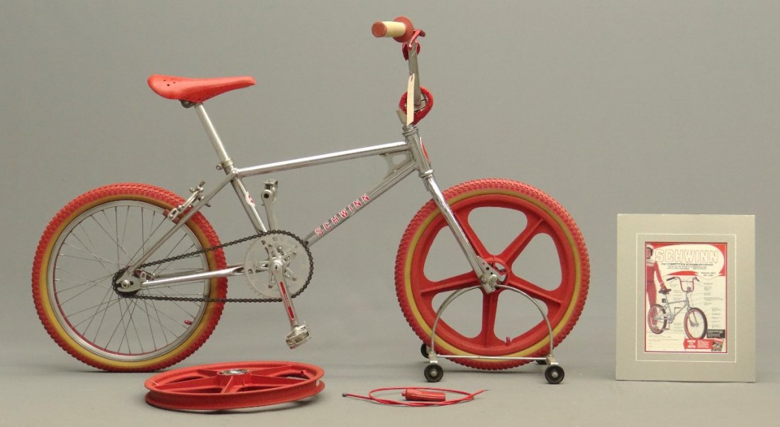 Schwinn BMX Bicycle: C. 1980's Schwinn SX000 BMX bicycle. "Team Schwinn" crank set, KTT "lightning" pedals, "Skyway" mag (Tuff Wheel II), 20 x 2 125 "Union" tires, Shimano "Via" hubs, Redline handle bar stem, Shimano brak