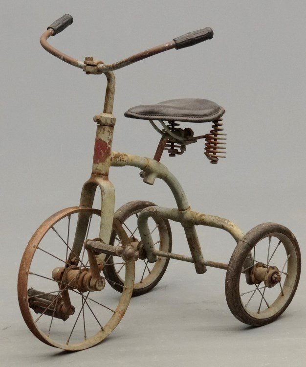 C. 1920's Tricycle: C. 1920's Childs tricycle. Appears to be original. 10 1/2" Front and 8" rear wheels. As found condition.