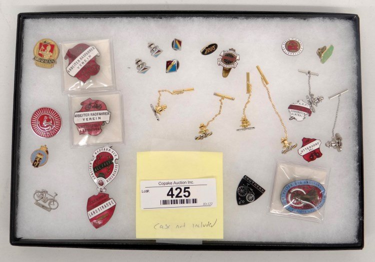 Bicycle Jewelry, Pins & Misc. Lot: Lot (25) pieces including enameled European pins (dated 1896, 1921, 1924), Norman Cycles pin etc. Good condition. Provenance Howie Cohen Collection Colorado. Case not included.