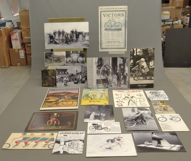 Bicycle Posters: Lot of (15) contemporary bicycle posters. Contains contemporary Charles Atlas body building poster. Good condition. Provenance Howie Cohen Collection Colorado.