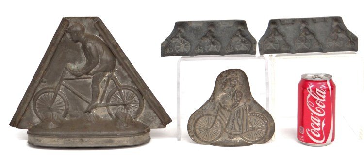 Bicycle Molds: Lot (3) early bicycle molds including man on safety bicycle 9 1/2" Ht. and woman with safety bicycle, 6" Ht., along with lead mold (made to cast a monkey riding a high wheel or ordinary bicycle). Good