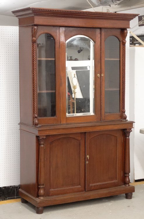 Mahogany Secretary: Mahogany two part secretary. Top has dentil molded cornice over mirrored door, base with two doors. 47" x 20"x 82 1/2" Ht.
