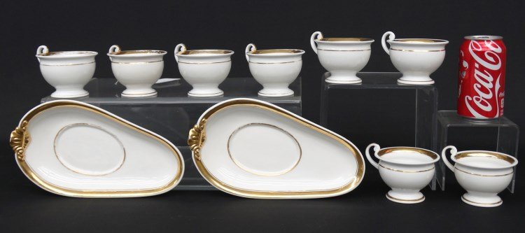 Old Paris Lot: Lot including (8) earl Old Paris gold band coffee cups, pair oval gold band dishes (10" L.).