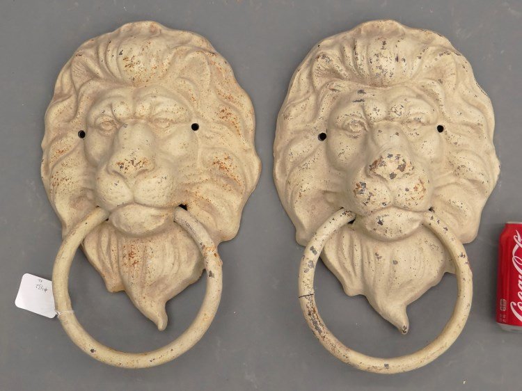 Cast Iron Lion Ornaments: Pair cast iron lion face with ring ornaments. 11" x 16" Ht.