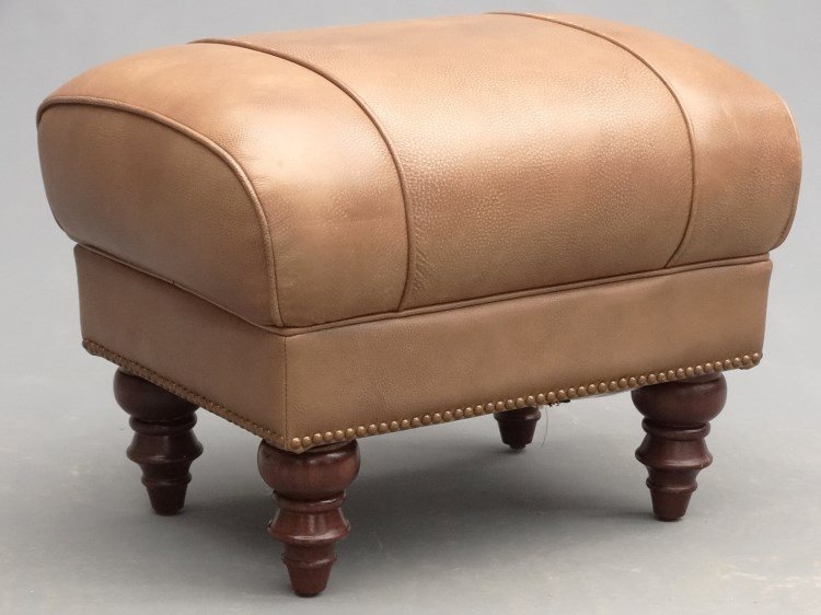 Footstool: Upholstered footstool with turned feet. 24" x 18" x 18" Ht.