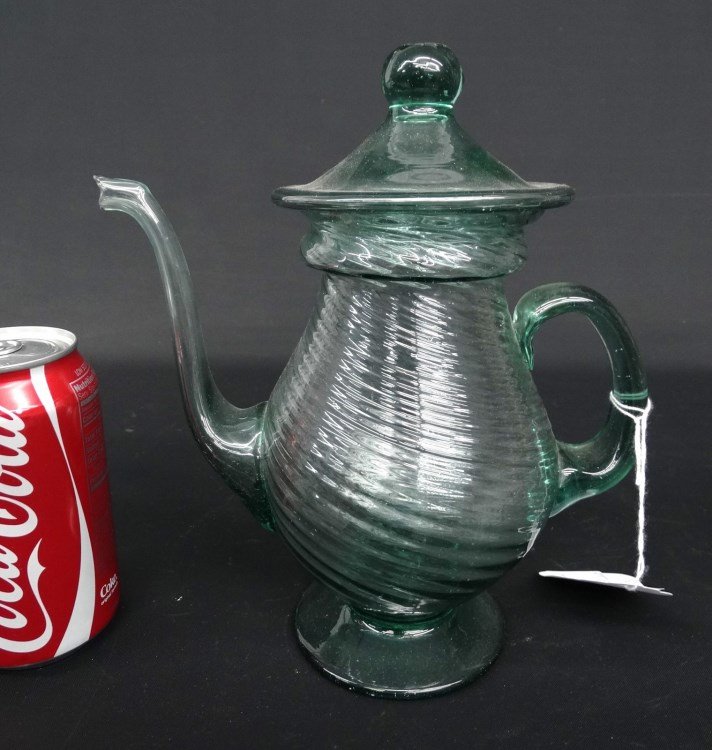 Glass Pitcher With Lid: Glass swirl design pitcher with lid. 9 1/2" Ht.