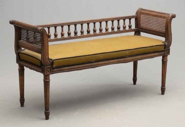 Window Seat: Decorative window seat with caned sides and upholstered seat. 49 1/2" x 18" x 28" Ht.