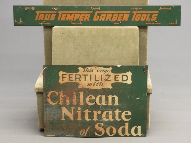 Sign Lot: Lot (2) signs including "TRUE TEMPER GARDEN TOOLS" (48" x 6" Ht.), and "THIS crop FERTILIZED with Chilean Nitrate of Soda" (28" x 19 1/2" Ht).