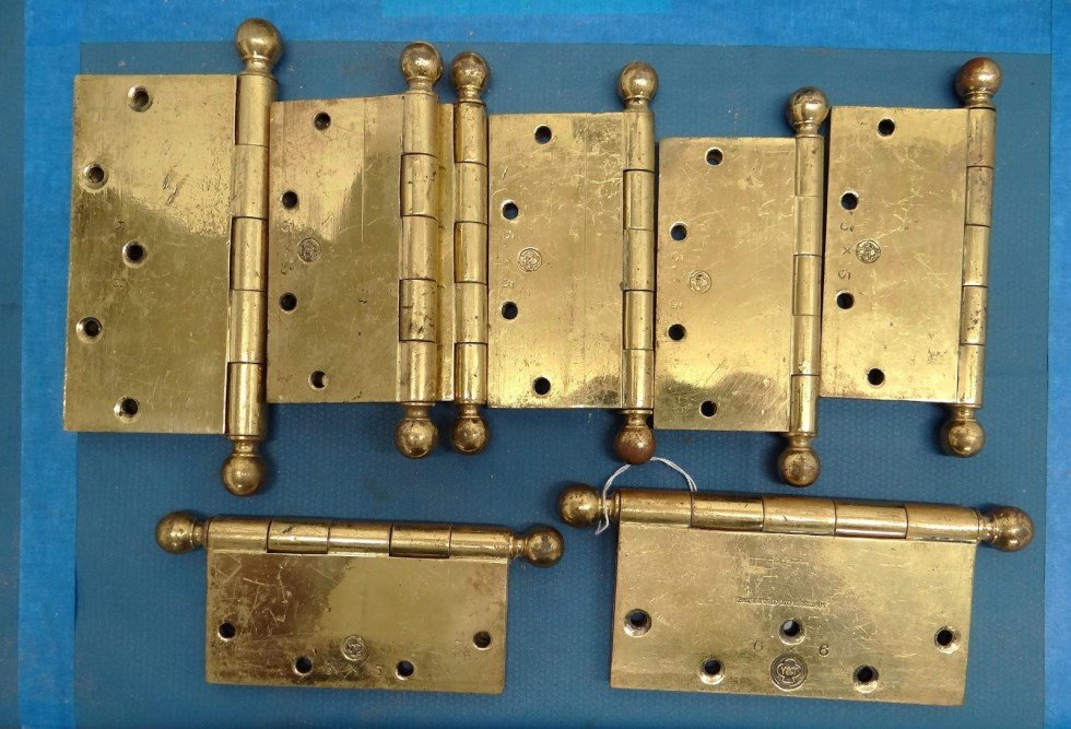 Brass Hinges: Set of (8) 19th c. brass hinges marked "Y & T" and "Patented Nov. 22, 1887". (2) 3 1/2" W., 8" Ht., (6) 2 3/4" x 6 3/4".