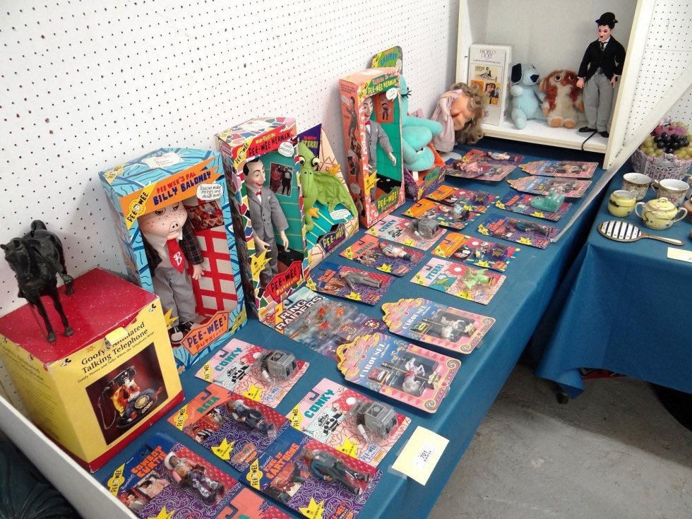 Pee Wee Herman & Misc. Toy Lot: Large lot misc. Pee Wee Herman lot including large dolls, action figures, Charlie Chaplin doll etc.