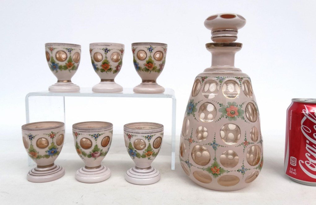 Czechoslovakian Decanter Set: Czechoslovakian decanter set including decanter (10" Ht.), along with (6) matching cups (3" Ht.). Signed underside "Made By Bartlys".
