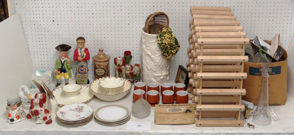 Misc. Lot: Misc. lot including wine racks, Toby style mugs, Staffordshire style figurines, etc.