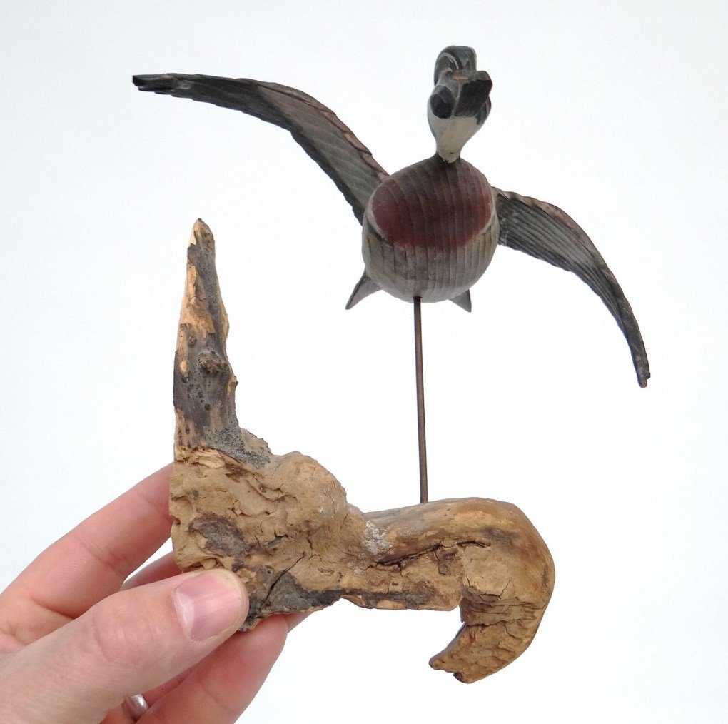 Carved Bird: Polychrome painted wooden carved bird. Faint signature "Harry...". 7" wing span, 7" Ht.
