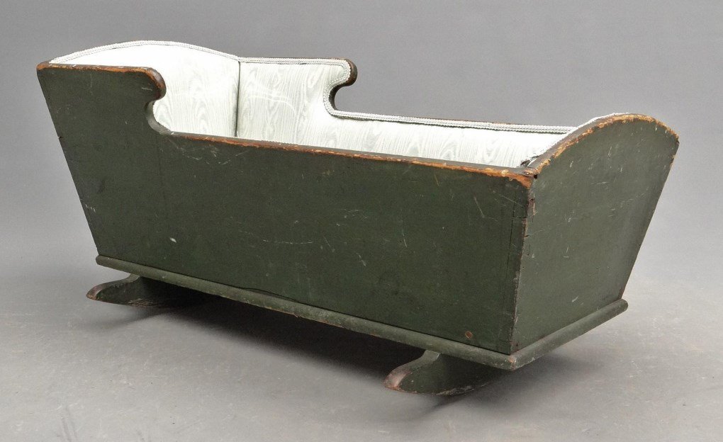 19th c. Cradle: 19th c. cradle in old green paint. 36" x 21" x 20" Ht..