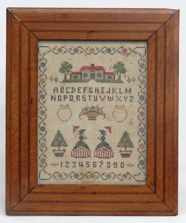 Sampler: 20th c. sampler with wooden frame. 22" x 18 1/2" overall size.