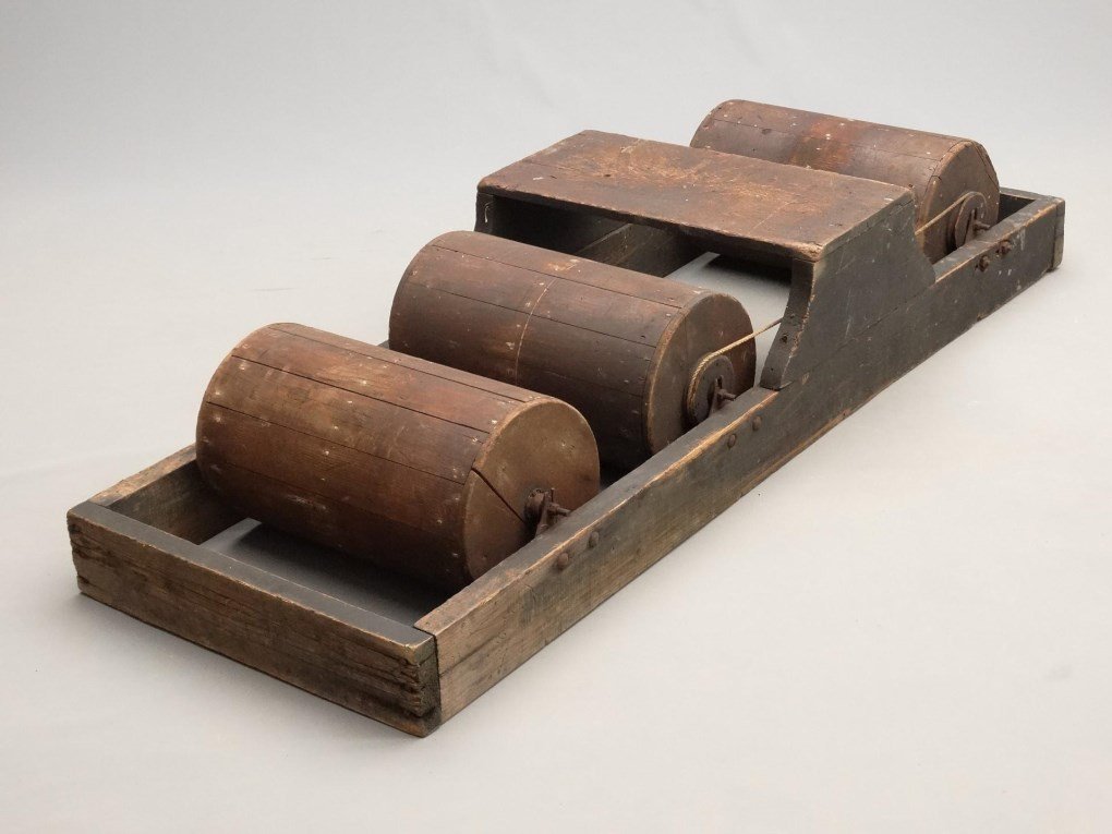 C. 1920's Training Roller Stand: C. 1920's Training bicycle roller stand. Frame: 74 1/2" L. x 26 1/2" W. x 13 1/2" Ht.. Old green paint, good usable condition.