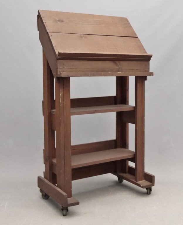 Lectern: Rolling lectern. 24" x 15" x 44" Ht..