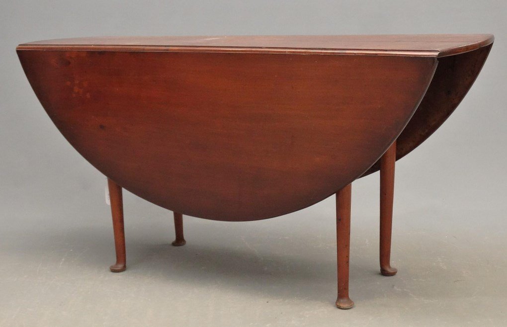 18th c. New England Dropleaf Table: 18th c. Queen Anne New England cherry dropleaf table. Top 17" x 53" with 18" leaves, 27" Ht..