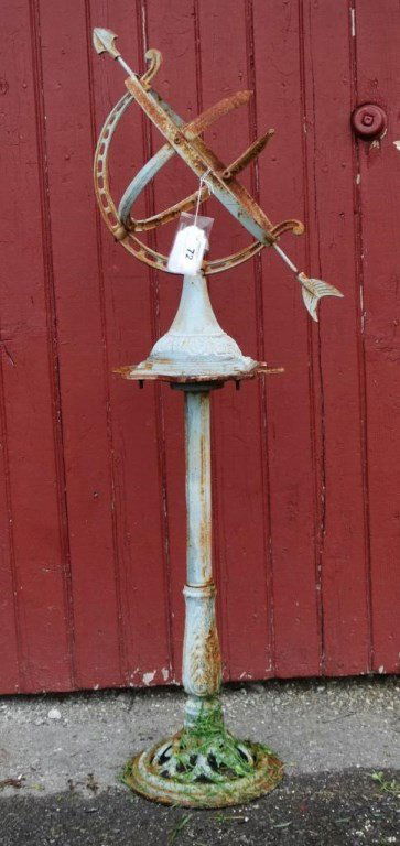 Armillary Sphere: Cast iron armillary sphere. 49" Ht..