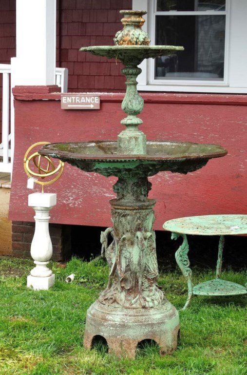 Cast Iron Fountain: Cast iron three part fountain with bird motif on base. 40" D., 76" Ht.. Possibly Fisk.