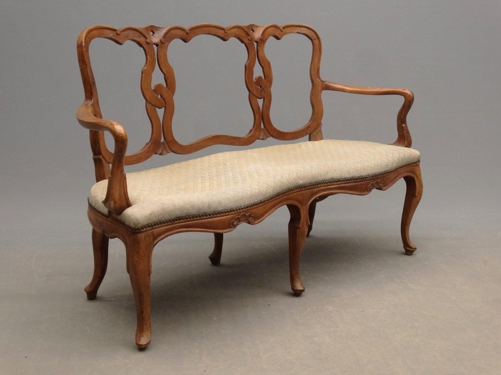 Italian Settee: Italian carved six leg settee with upholstered seat. 49" x 19" x 34" Ht..