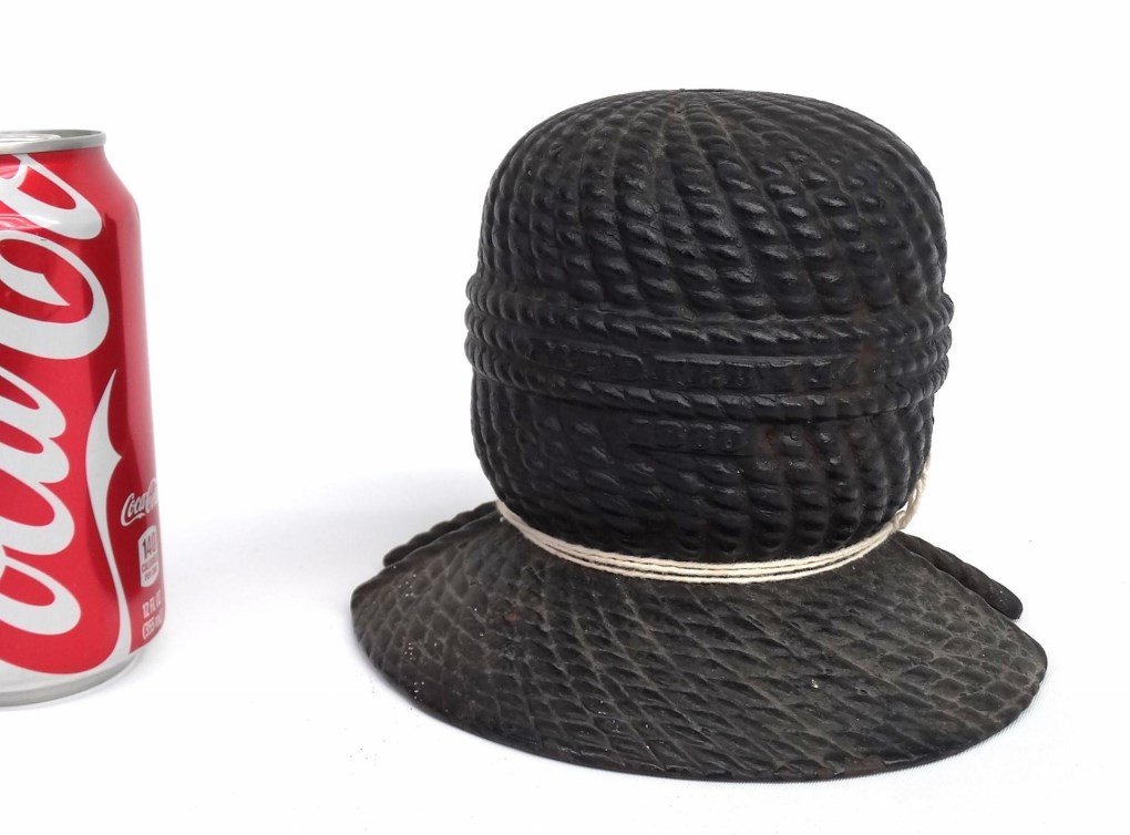 Cast Iron Beehive String Holder: Cast iron beehive string holder. 6 1/2" D., 5" Ht..
