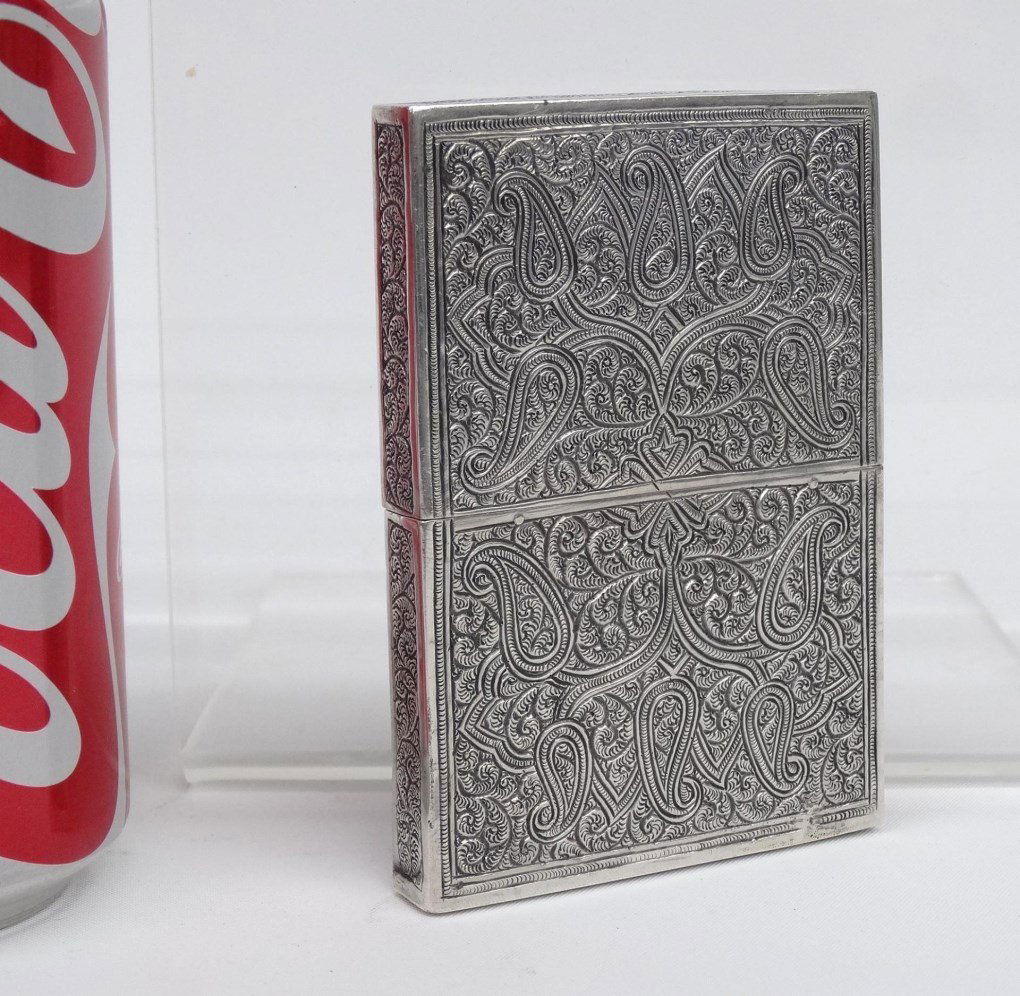 Silver Card Case: Silver (.800), engraved card case. 2 1/2" x 3 3/4". 94 grams.