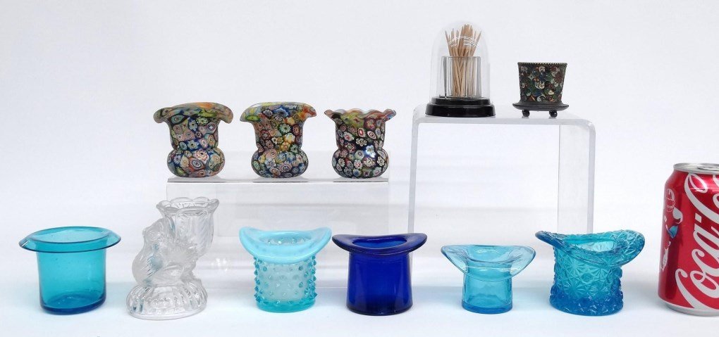 Toothpick Holders: Collection of (11) toothpick holders including Webster & Son, clear glass with frog, dome with Bakelite, Fostoria blue coin, opal Hobb, crackle, Fenton, (3) Millefiori, blown etc..