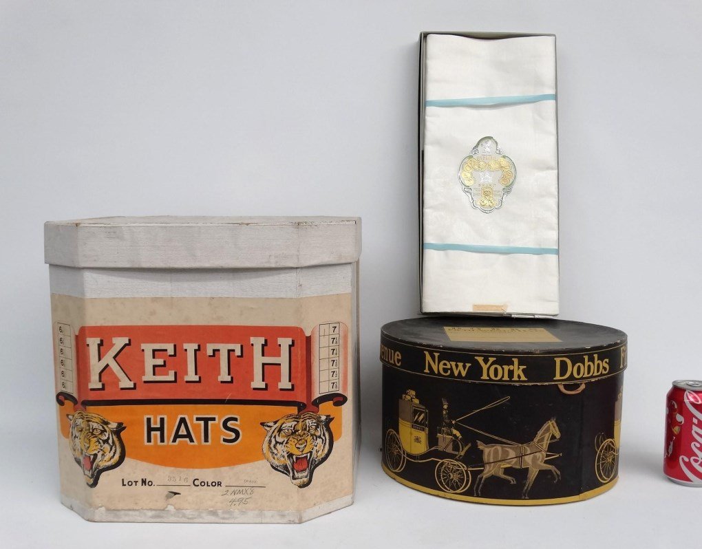 Hat Box Lot: Lot including (2) hat boxes and boxed linens.