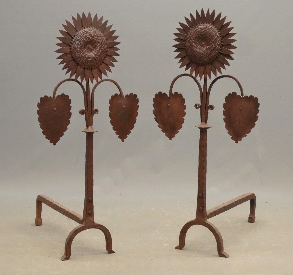 Pair Of Sunflower Andirons: Pair of blacksmith made sunflower andirons. 37" Ht., 23" D..