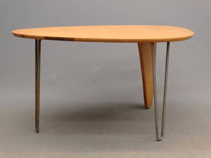 Isamu Noguchi "Rudder" Table: Isamu Noguchi "Rudder" table (for Herman Miller), with metal and wooden legs. 50" x 36" x 26" Ht..