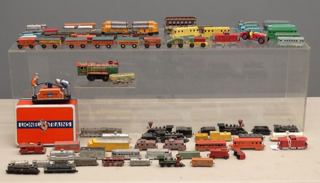 Train Lot: Lot of various trains including "Migetoy", "Tootsie Toy" etc.. Over (50) examples.