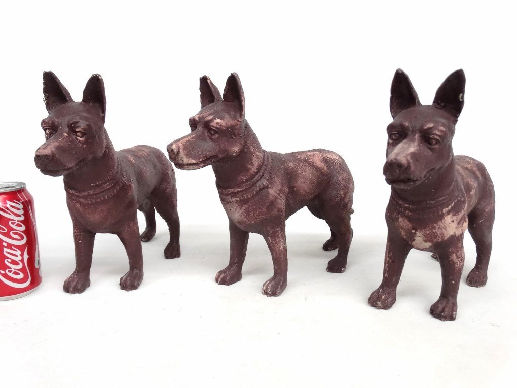 Cast Iron Dogs: Lot (3) cast iron dogs. 12" x 10".