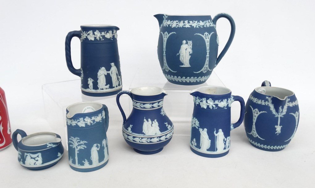Wedgwood Lot: Lot (7) pieces of Wedgwood Jasperware pitchers.