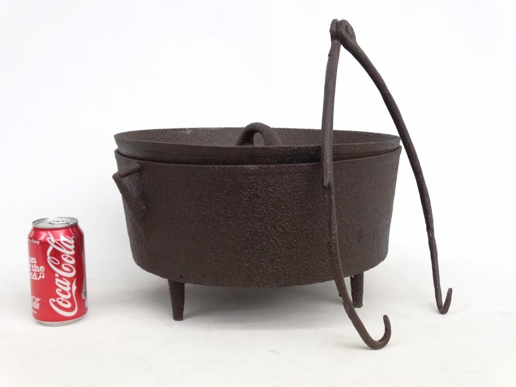 19th c. Cast Iron Dutch Oven: 19th c. cast iron Dutch oven, marked "14" with "Scotch Hands". 14" D., 9" Ht..