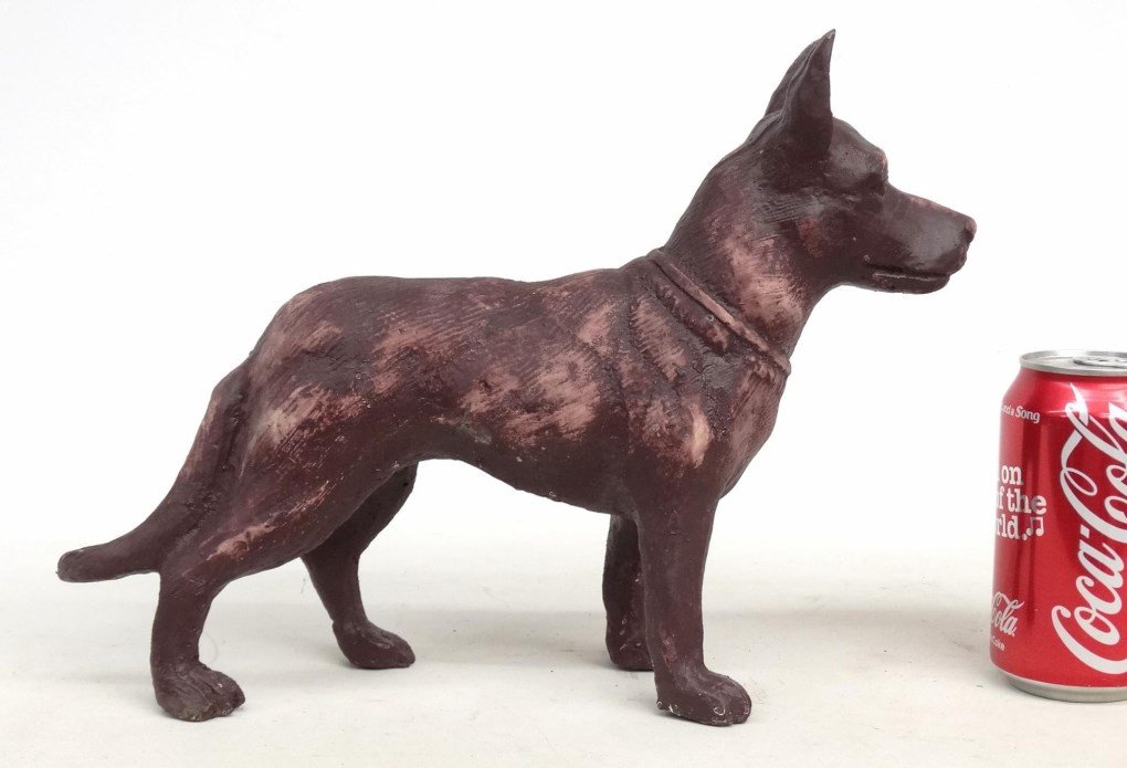 Cast Iron Garden Dog: Cast iron garden dog. 14" L..