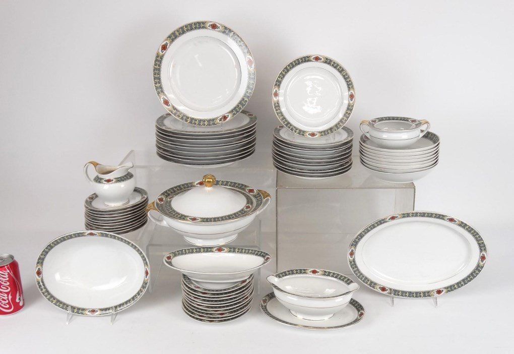Bavarian Dinner Service: Bavarian dinner service including covered dish, (10) 9" plates, (10) 6" plates, (8) bowls, gravy, (11) 7 1/2" plates, cream and sugar and (3) platters, also various saucers, no cups. Imperfections.