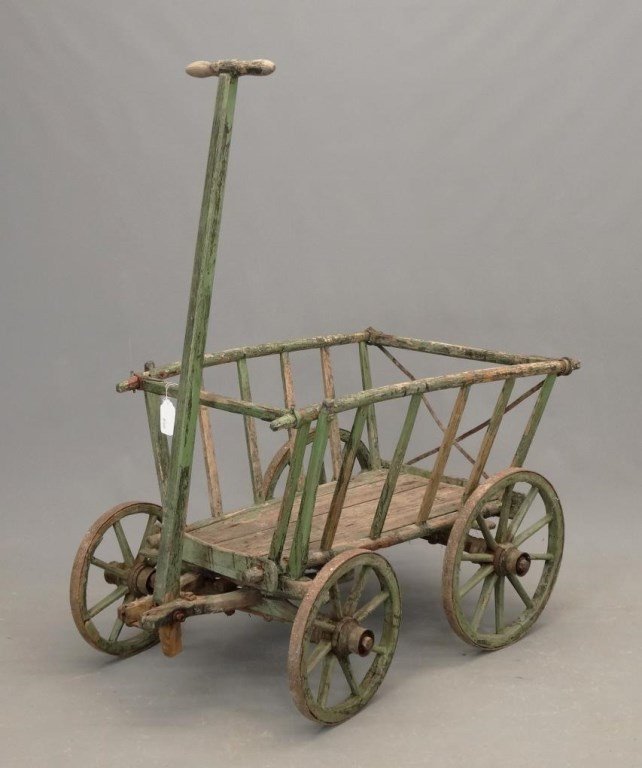 19th c. Pull Wagon: 19th c. pull wagon in old green paint. 24" x 33" x 23" Ht..