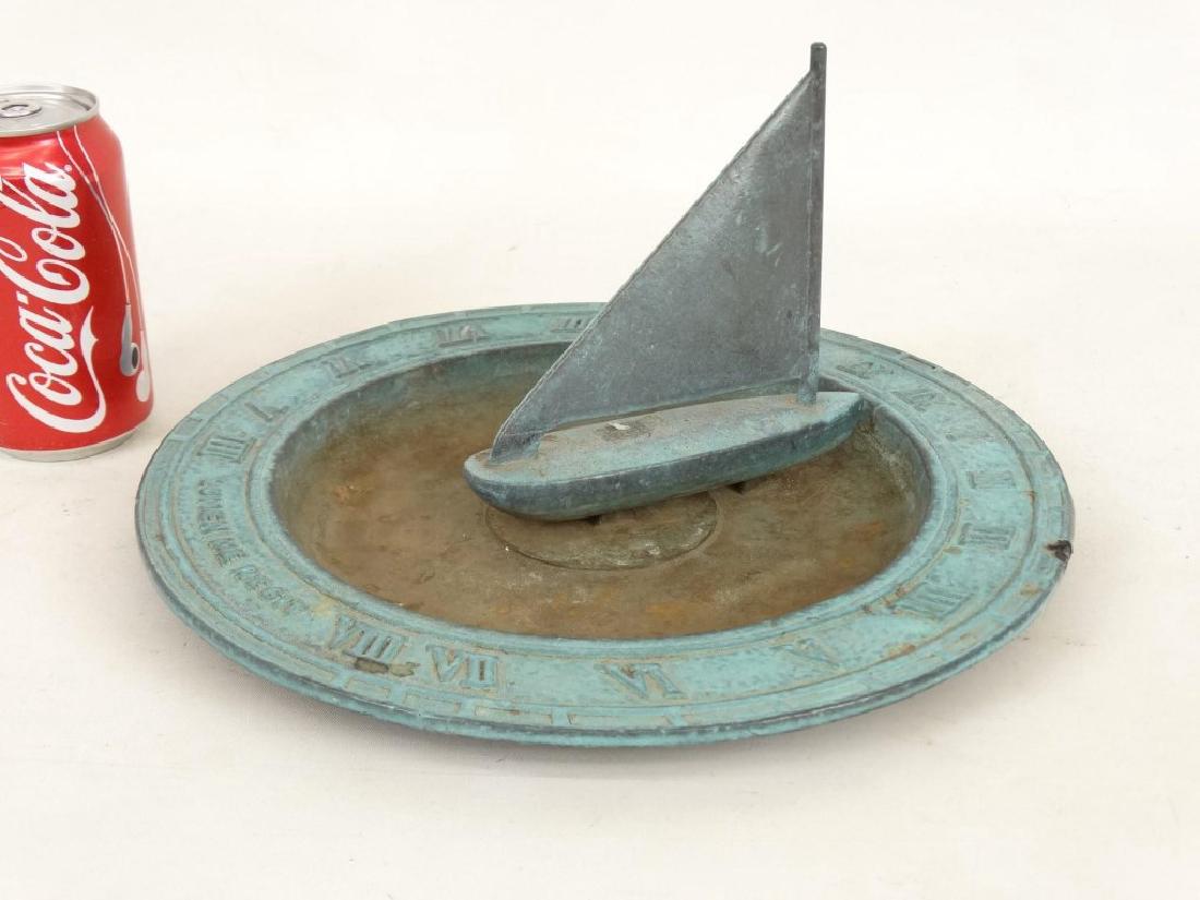 Bronze Sundial With Boat: Bronze sundial with boat. 12" D., 7" Ht..