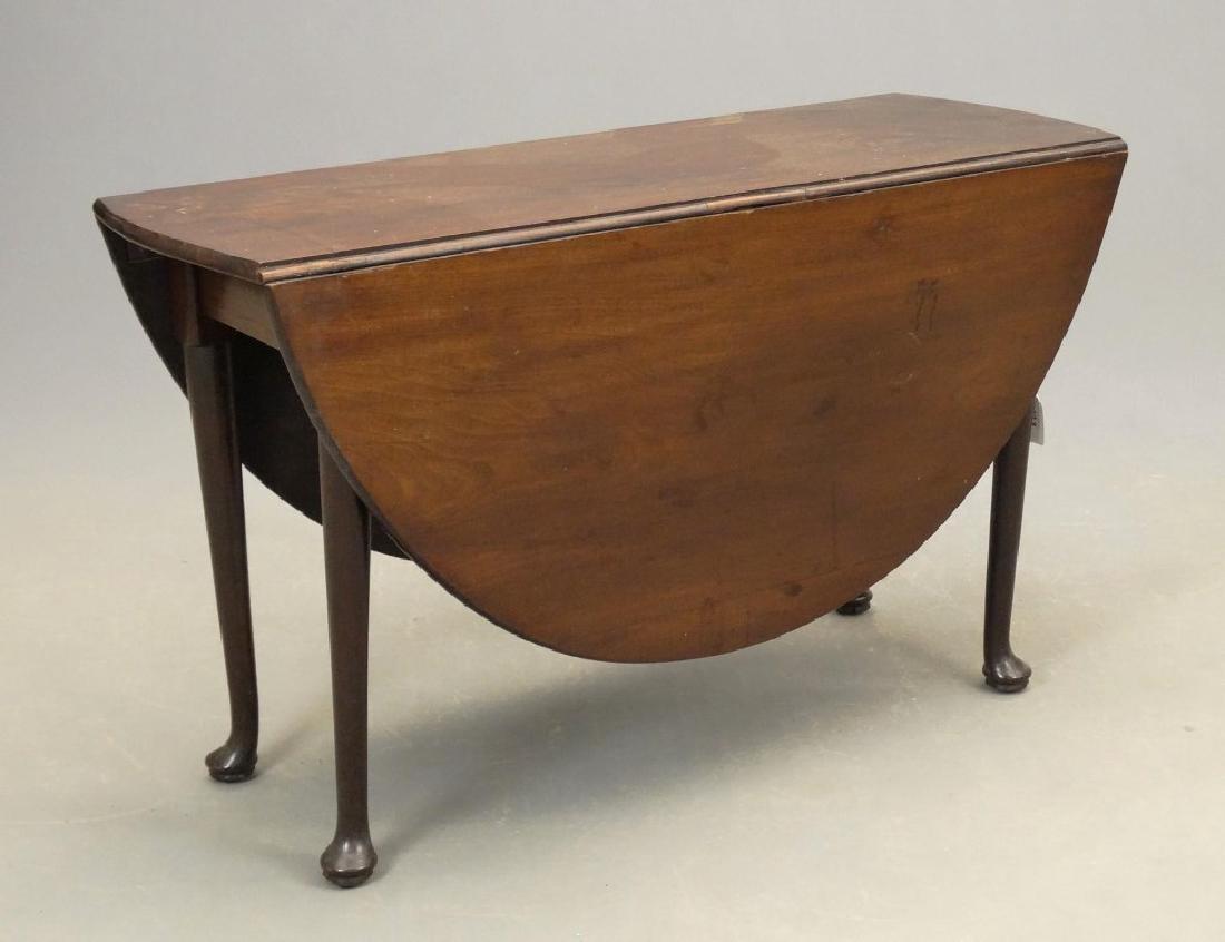 Queen Anne Dropleaf Table: 18th c. mahogany Queen Anne pad foot dropleaf table. Top 46" x 17" with 20" leaves, 27 1/2" Ht..